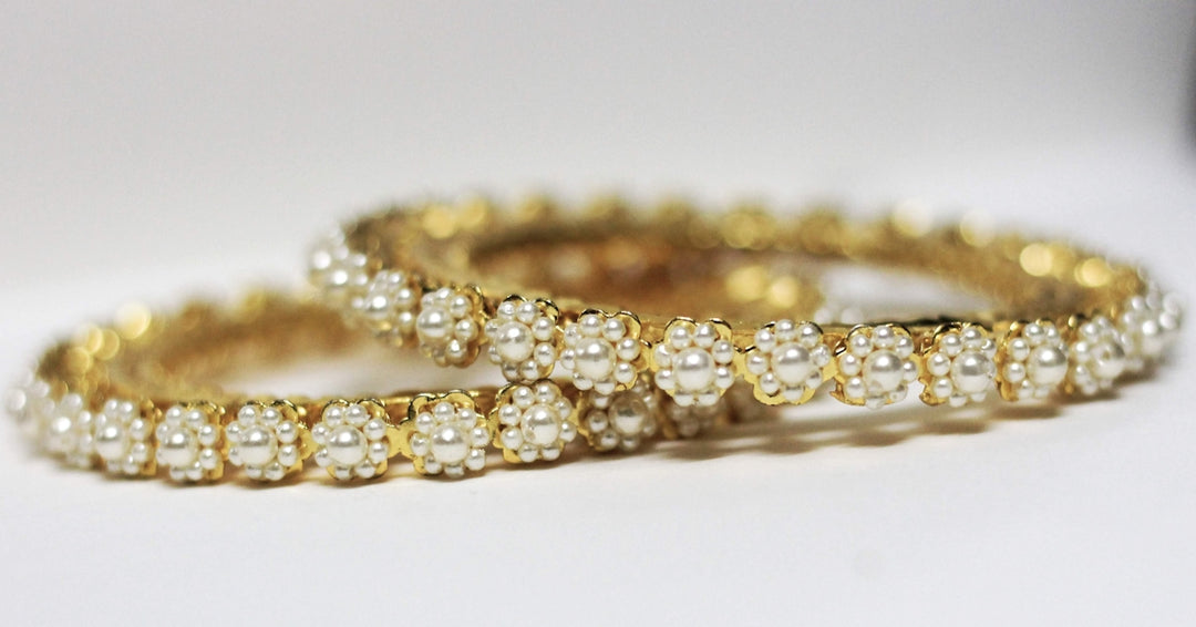 A couple of rings sitting on top of a table